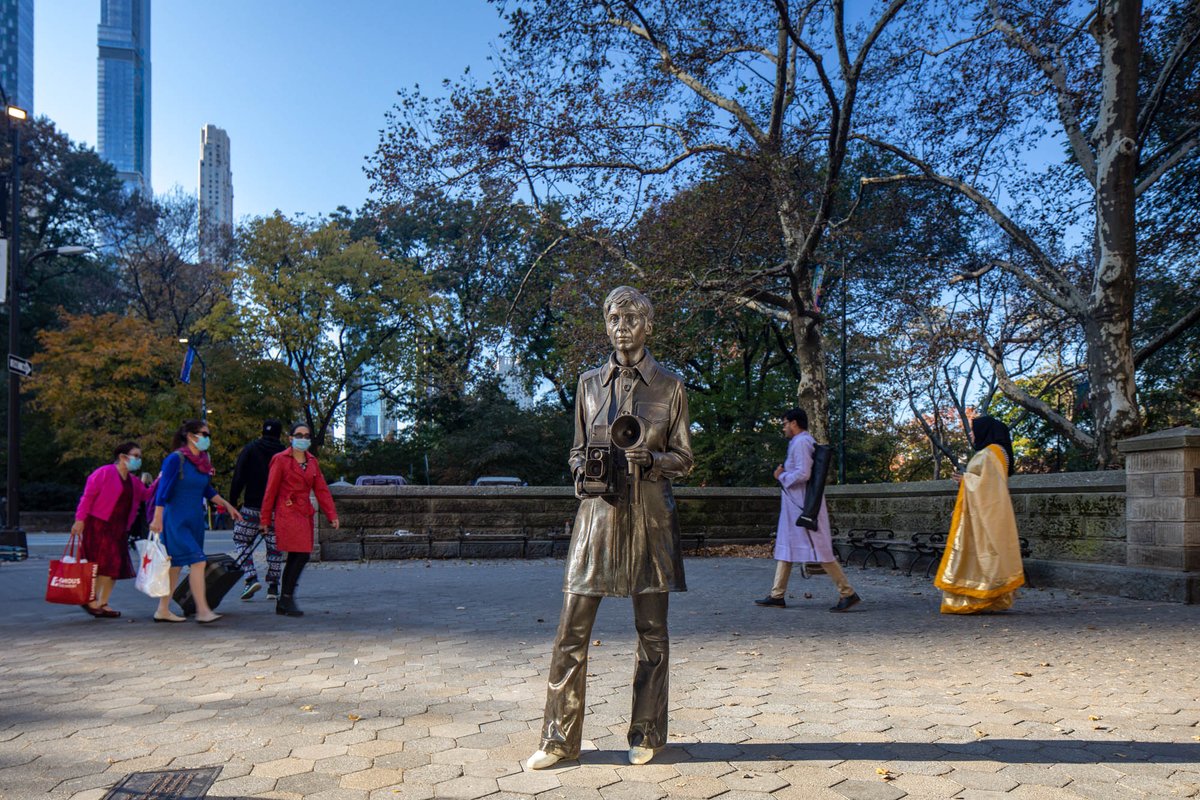 “I was walking from there and I thought I just saw someone standing there with a camera in their hands." - Visitor to #GillianWearing's monument to Diane Arbus. The sculpture stands on the pavement without a pedestal, almost blending in with the foot traffic of <a href="/CentralParkNYC/">Central Park</a>.