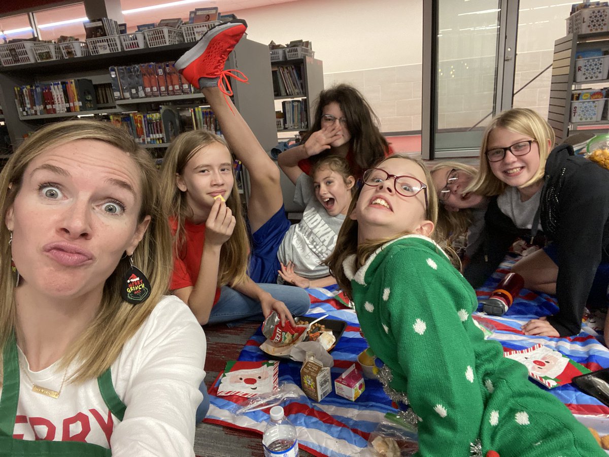 WGILibrarian's tweet photo. Fun Christmas picnic with my library ambassadors! I so appreciate the help of these dedicated, smart, kind, and fun girls! 📚🎄@woodgatemisd #WGIlibrary https://t.co/pM9PJRUQ5U