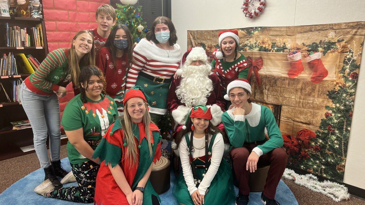 RMHS_Theatre's tweet photo. Theatre and Choir being elves and singing carols at the RMCEE Literacy Night! @RedMtLions @RedMtn_Choir @mesamusiced @mpsaz https://t.co/GBbPVIOURh