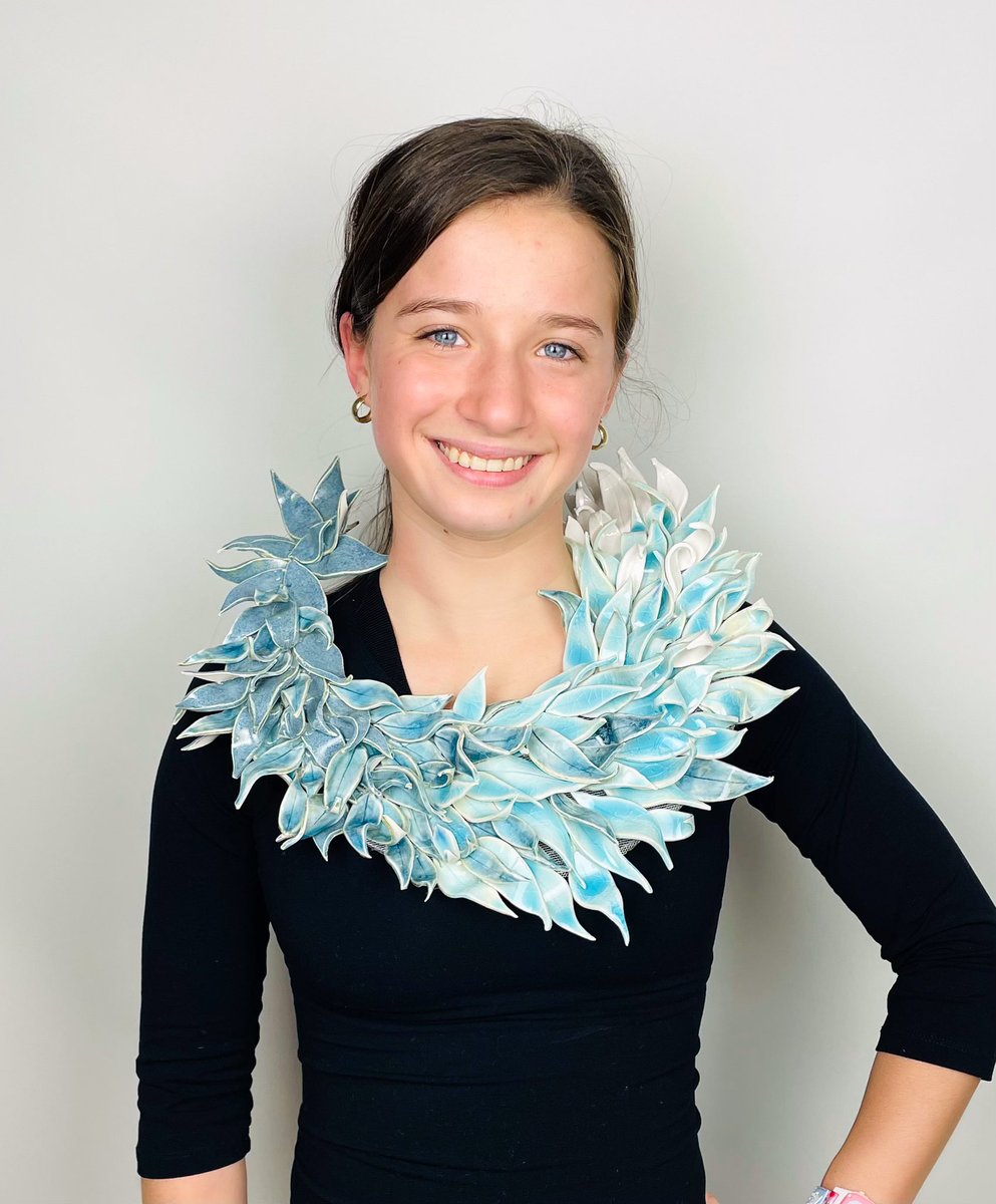 My talented student, Taylor, and the gorgeous porcelain necklace she made in Advance Ceramics class at WHS! #wiltonwayct #ceramics #porcelain