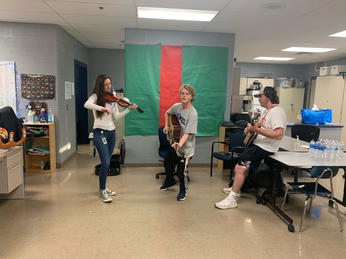 Eli Deml, Ms. Maddie Denton and Hank Dillard playing at the Siegel Best Buddies Christmas party!