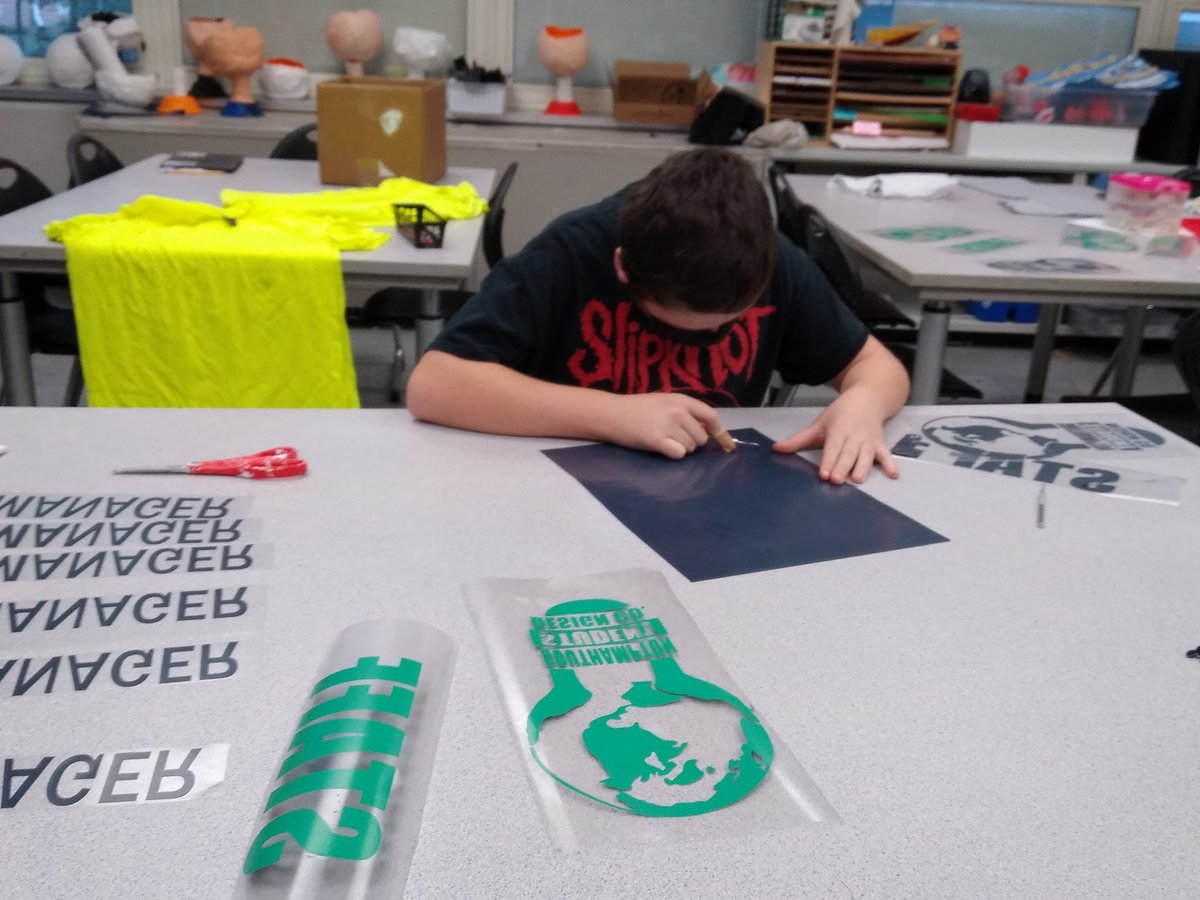 ssdesignc's tweet photo. Some of the staff working hard designing &amp; producing some products. Using @canva, @AgcEdcuation, &amp; @SawgrassInk products for designs. 
Big in school sale next week. 
#socialentrepreneurship #StudentRunBusiness 
#STSWarriors https://t.co/BbmKA3VLrS
