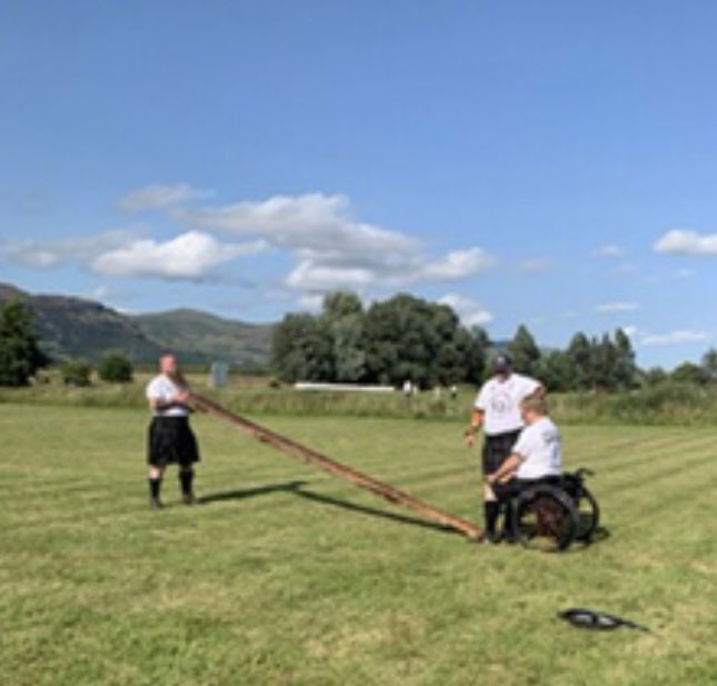 WHighlandersCIC's tweet photo. Throw back. 

Davey Dent taking on the caber from his wheelchair at the 2021 @StirlingGames were he also set a nee world record in the shotput, also at picking up his trophy at the #DestinyDay taking on the @ArdblairStones 
#ProveThemWrong https://t.co/4C3Xm3sBRz