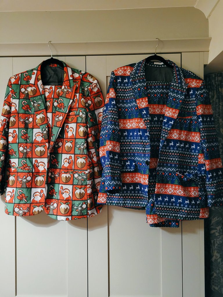 PrepSchTeacher's tweet photo. The biggest decision of the week. Which one do I wear on Friday? #ChristmasJumperDay #daper #teacherstyle https://t.co/S0tWUQl7jz