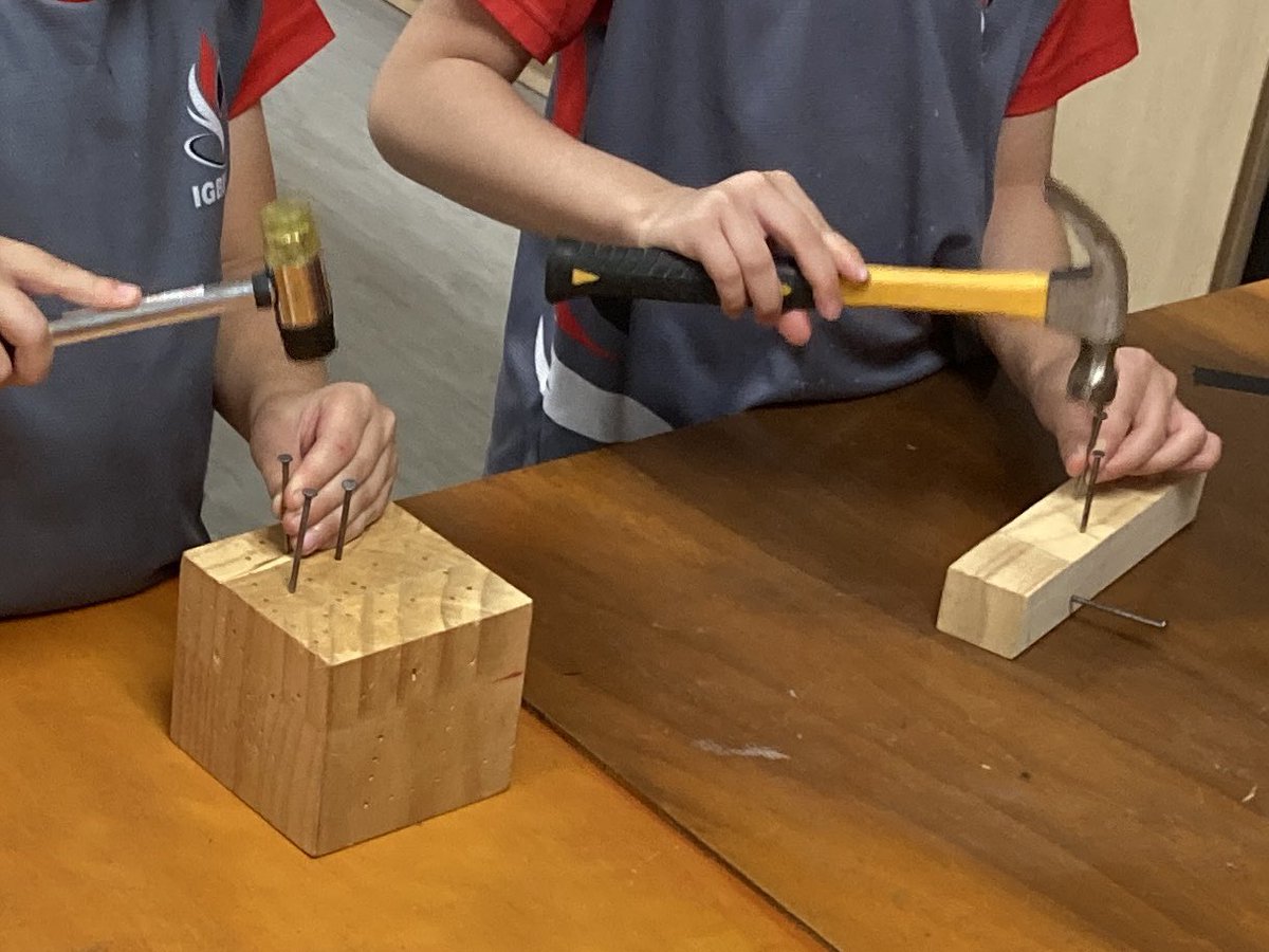 harves4556's tweet photo. HammerTime with Grade 1 students investigating the wedge as a simple machine @IGBintschool. Some nice nail art in the making. https://t.co/Xlt1Mni7AI