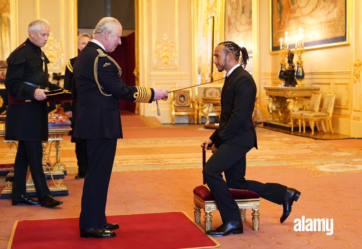 Sir Lewis Hamilton is made a Knight Bachelor by the Prince of Wales at Windsor Castle. Image ID: 2HATNCR // Dominic Lipinski // PA Wire #alamyeditoril #LewisHamilton