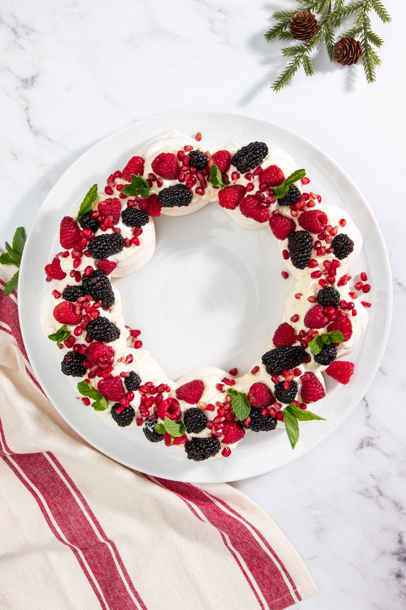 It's time to deck the halls, and we won't say no to a recipe that doubles as a centerpiece. This wreath is made up of mini pavlovas and topped with fresh fruit for a gorgeous (and egg’ceptionally delicious) dessert! 
Get the Recipe Here: dakotalayers.com/index.php/holi…