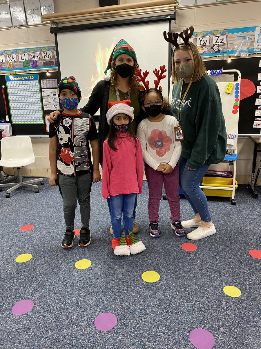 Winter fun at school! Door decoration, students from last year that visit us every morning &amp; silly Christmas headwear! 🎄 🤶 <a href="/Mrs_McElhose/">Mallory McElhose</a> <a href="/JWReasonElem/">JW Reason Elementary</a>