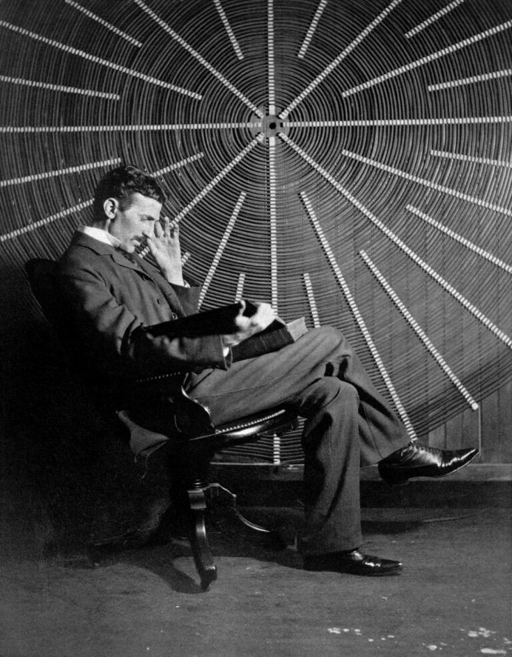 UniverCurious's tweet photo. Nikola Tesla, with Roger Boskovich’s book - “Theoria Philosophiae Naturalis,” in front of the spiral coil of his high-frequency transformer at East Houston St. 46, New York, c. 1898. https://t.co/aVWlVOeGAi