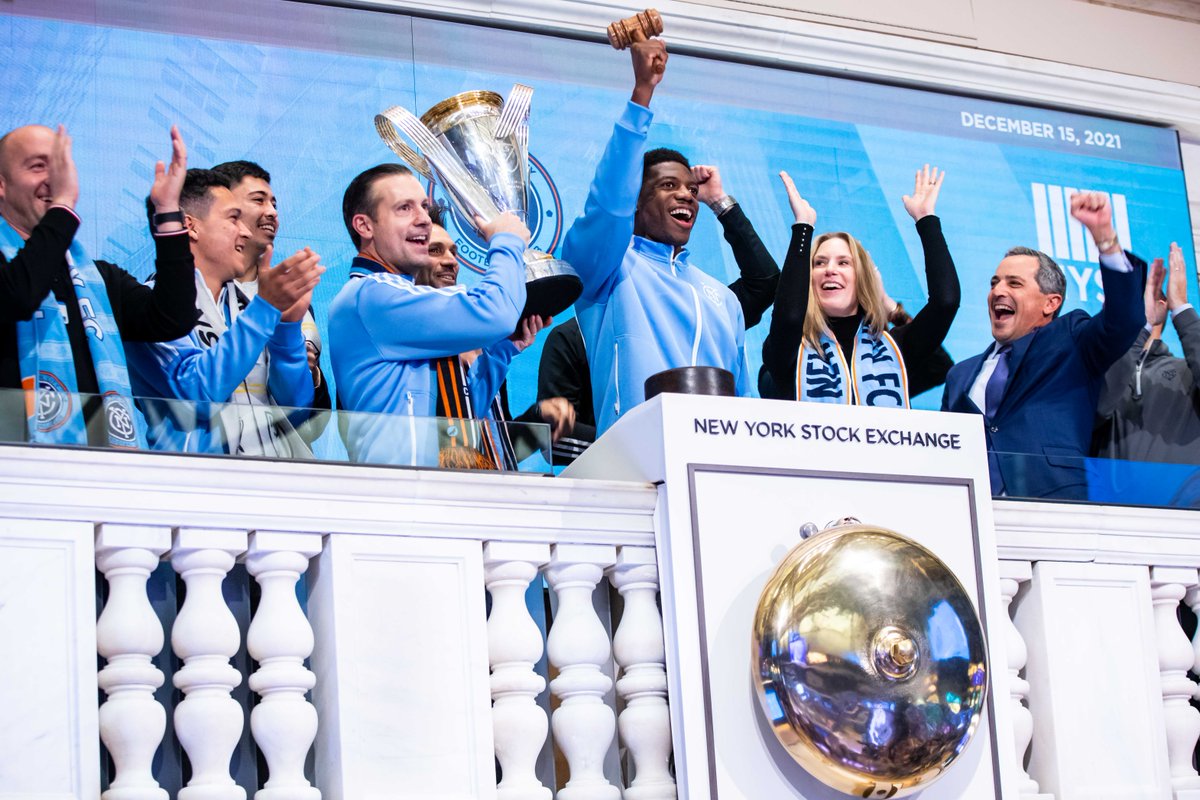 NYSE's tweet photo. .@NYCFC celebrates winning #MLSCup for the first time in Club history. 💙 This is the first time in 10 years a NY-sports team has brought home a championship title!  🏆 MVP @SeanJohnGK rings the Closing Bell 🔔 https://t.co/zbVccRsXzP