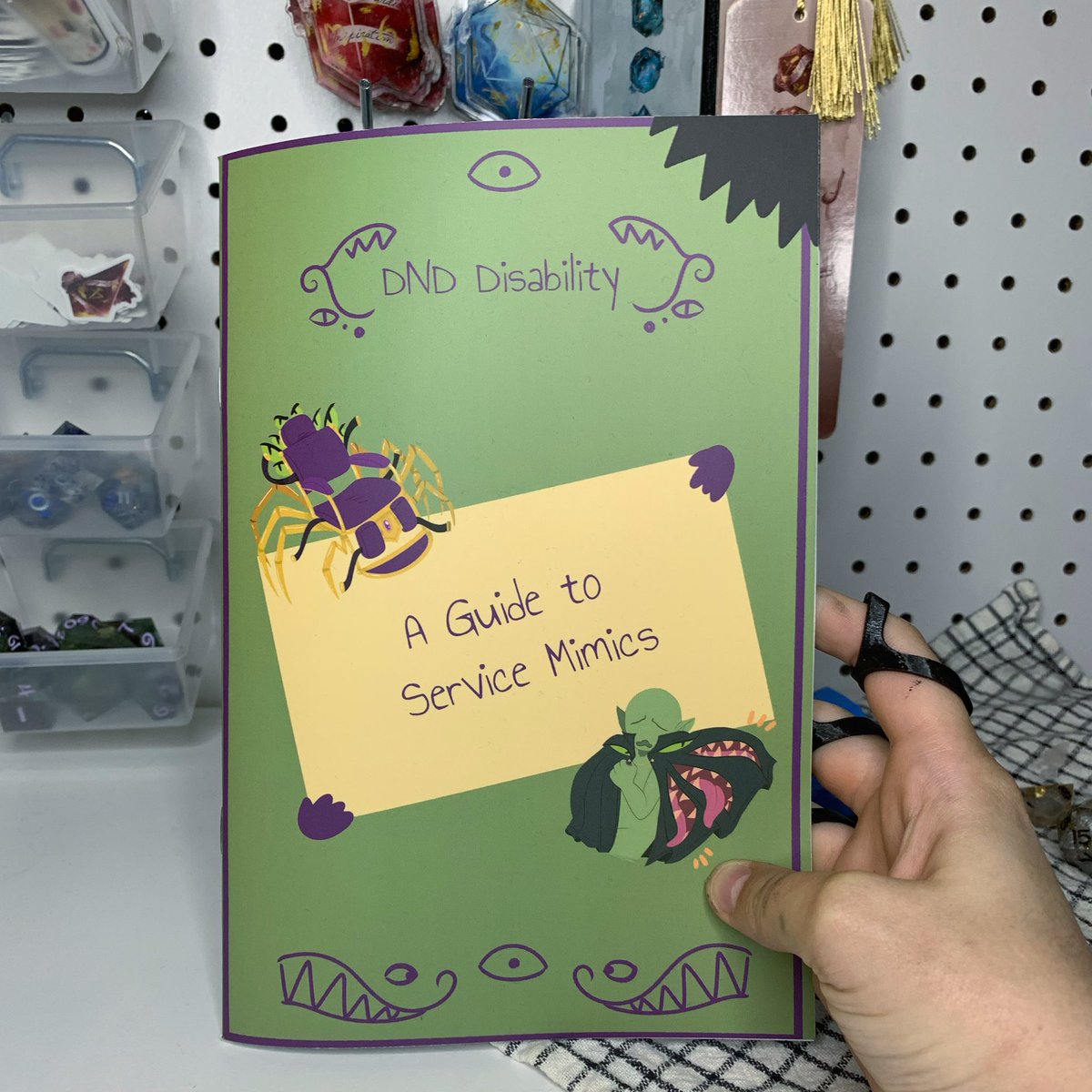 dnddisability's tweet photo. If you have not grabbed a copy of A GUIDE TO SERVICE MIMICS, some physical copies are back in stock! 

This zine includes:

- 10 Service Mimics 
- Dyslexic-Friendly Font
- 18 Original Art Pieces 
- Lore 
- 2 NPCs
- Certificate of Adoption https://t.co/hyvo48lK4u