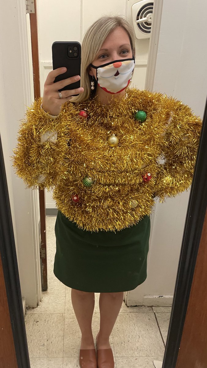 HSCSPrincipal's tweet photo. Festive sweater day! ๐ This gold number made an appearance again this year and brought many smiles and laughs! #12daysofMerriment https://t.co/Uo82FQ7vIv
