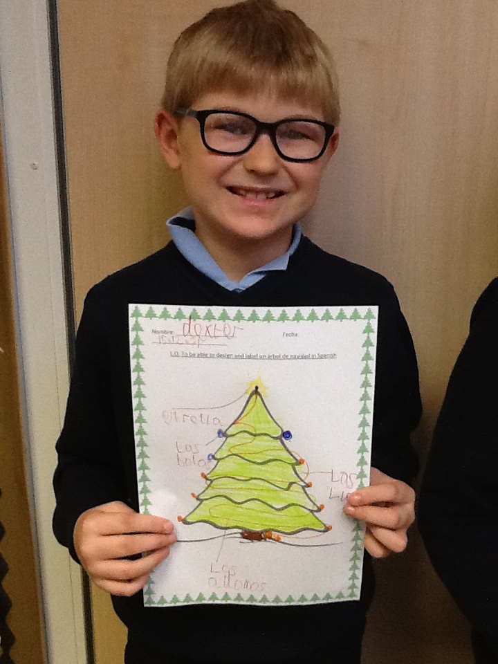 RiseParkSchool's tweet photo. Year 4 - Here are some of our wonderful Cuarto Grado showcasing some festive spirit with their arboles de Navidad 🙂 This week in Spanish, we learned about festive traditions in Spain and designed our own Christmas trees! #feliznavidad @RPLanguages https://t.co/p5hXtXJ9y4