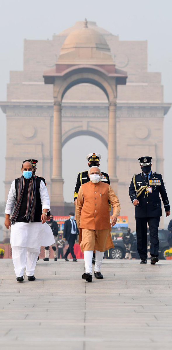 AdityaRajKaul's tweet photo. Looks like a regular photograph until you see it up close. It’s a moving tribute. Missing Man Formation as a mark of respect for India’s first CDS General Bipin Rawat. #VijayDiwas2021 https://t.co/FciZxpjw0G