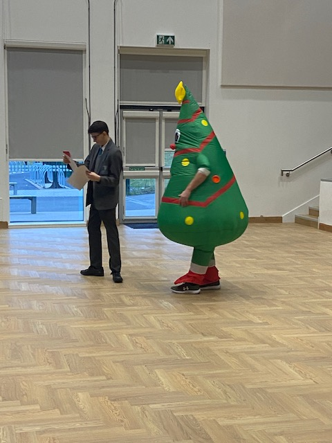 TonyrefailCS's tweet photo. Fantastic Year 11 Christmas Awards Assembly this morning. What a wonderful opportunity to celebrate our amazing pupils. An important message for everyone from Mr Griffiths - even though he was dressed as a Christmas tree! #HappyChristmas #family #sharing #celebrate #success https://t.co/Gjw7CJjR7B