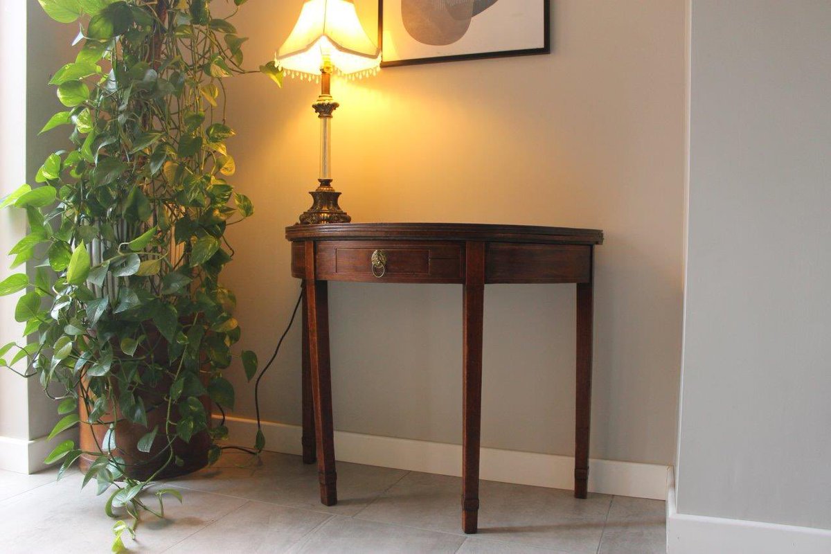 JosRiches's tweet photo. A gorgeous #Georgian tea table, top lifts up and legs move to make a circular dining table. Pic shows it in a half moon console table position. Timeless design. #antique #interiordesign #classic https://t.co/bvB5v26MOl