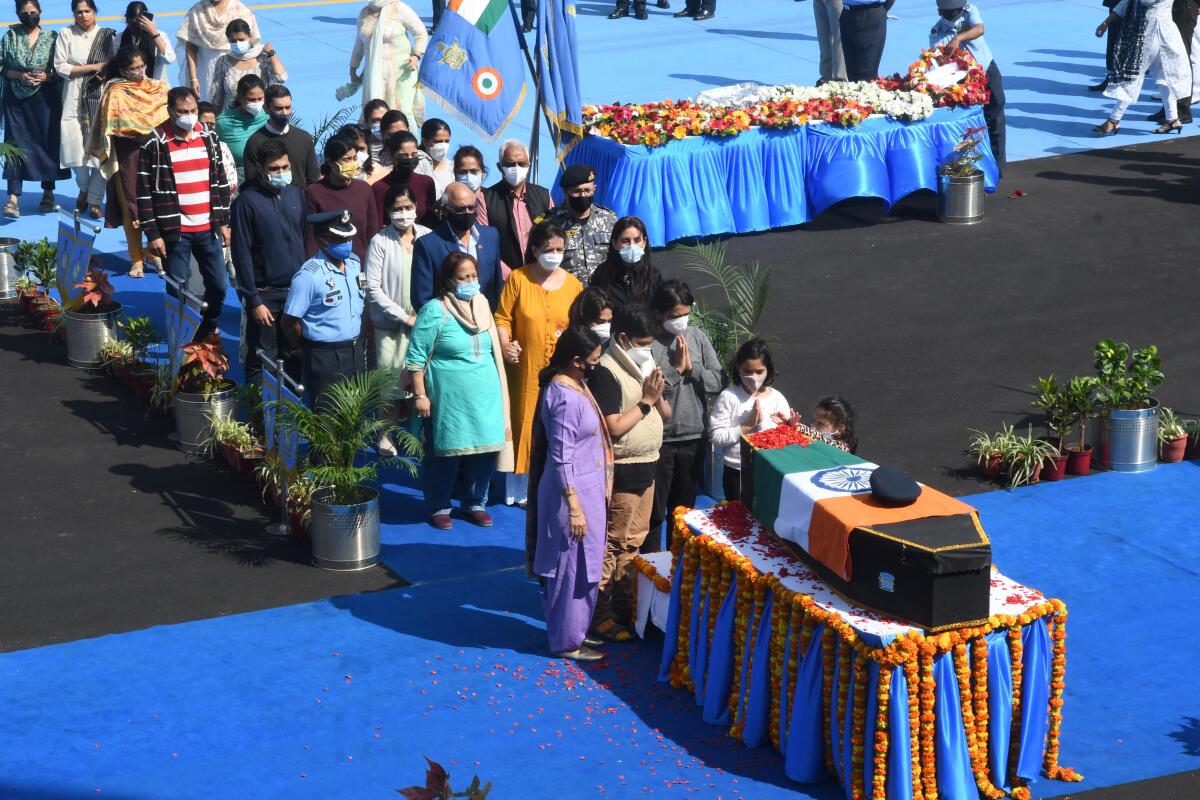 the_hindu's tweet image. Family members and officials pay respect to the mortal remains of Captain #VarunSingh, who succumbed to his injuries in a hospital in Bengaluru on Dec. 15. He was the lone survivor of the #helicoptercrash in which CDS Gen. Rawat and 12 others lost their lives.
📷: Sudhkara Jain