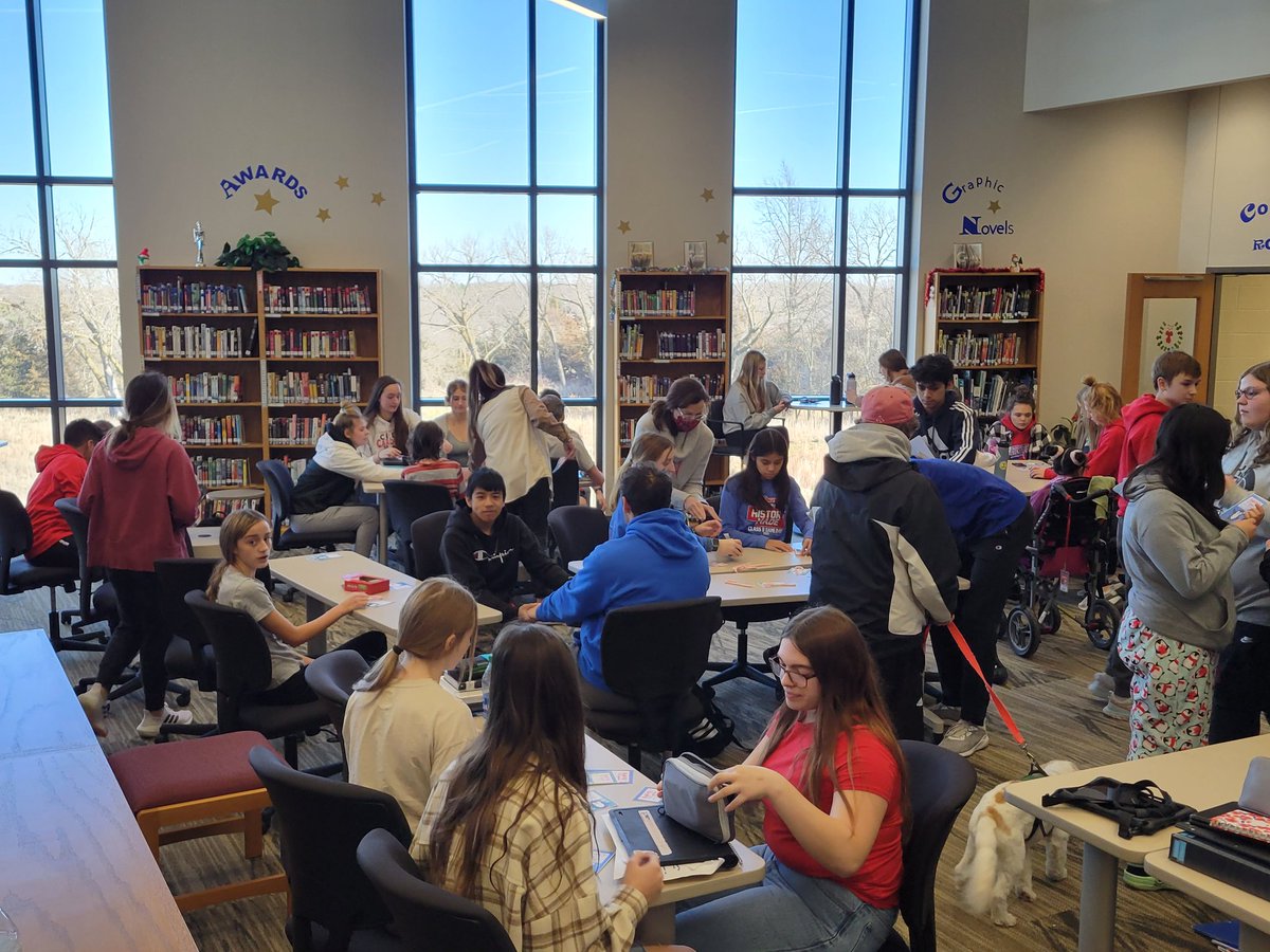 Circle of friends making Christmas cards with candy canes.  Awesome job CHS students.  #CardinalPride