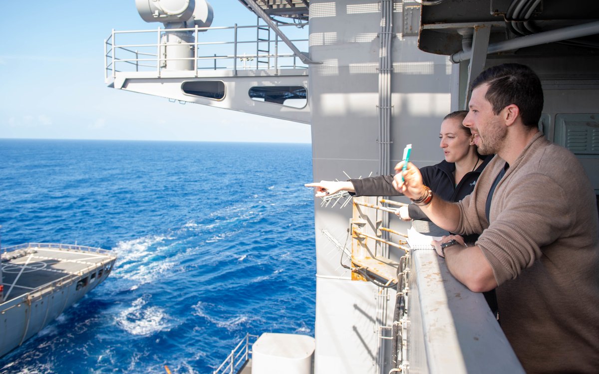 USNavy's tweet photo. Research leads to #NavyReadiness 🔬 ⚓️

Dr. Keith Zirkle, right, and Dr. Mallory Ladd, research scientists representing Center for Naval Analyses, currently embarked aboard @CVN70, observe a fueling-at-sea with #USNSRappahannock (T-AO 204). https://t.co/D47jFpuFlv