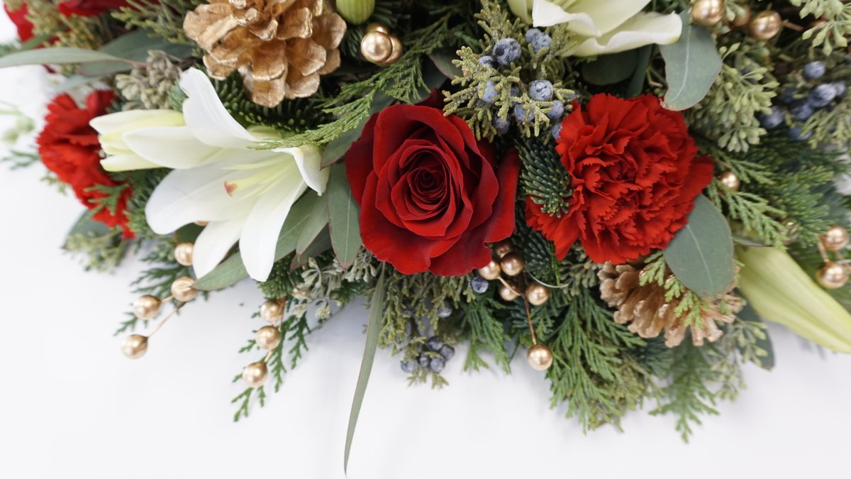 OpenBlooms's tweet photo. White lilies, red roses, red carnations, and greenery accents. https://t.co/C02nbbqohS