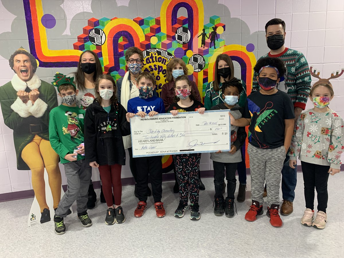 Slate Ridgemwas selected as winners of the 50/50 Reynoldsburg Education Foundation Raffle at the  Tree Lighting on Dec. 4th. We will use this money for student incentives throughout the year. Thank you, Mrs. Neff and the Reynoldsburg Education Foundation! 💜💛  #REYNProud