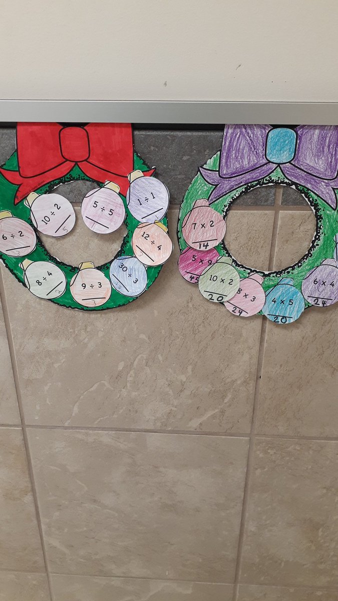 cycabrera76's tweet photo. Here are some examples of the multiplication and division wreaths my students did ❤ #GardensEl #MathChat #gatorslearn #holidays https://t.co/lBR9ldAs8a