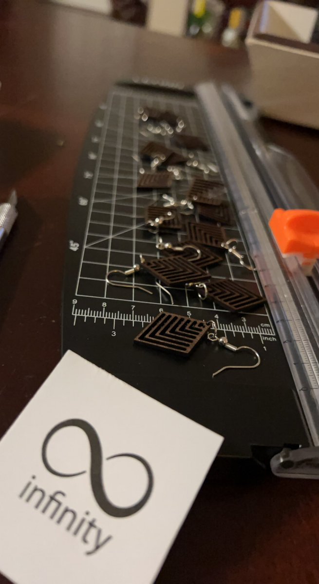 CalHoward's tweet photo. Earrings cut on @OrturOfficial LM2 laser engraver, basswood hand-dipped in stain #laser #handmade #handmadegifts #make #maker #woodworking #handmadejewelry https://t.co/qdCEUQja6A