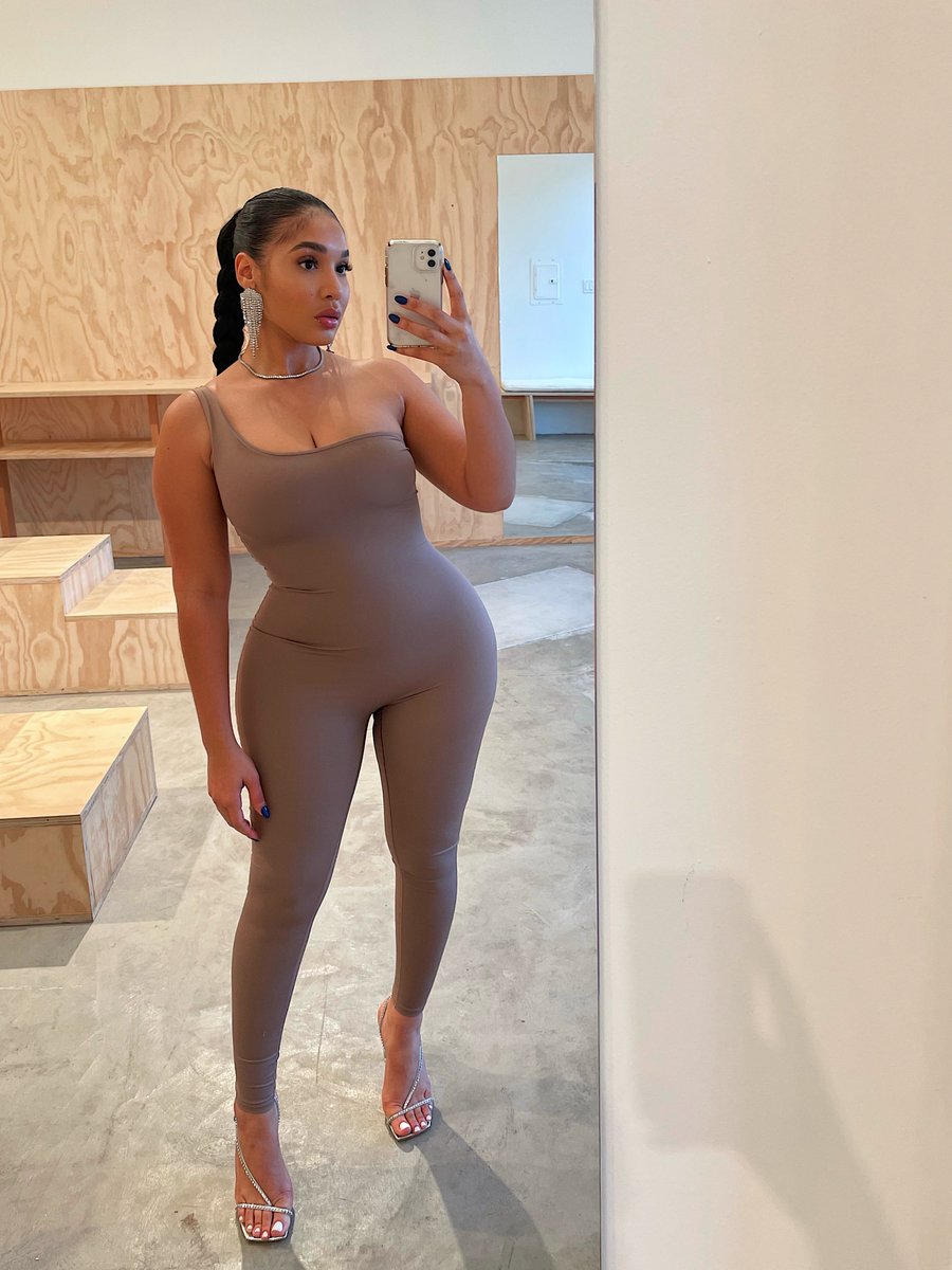 SKIMS on X: All-In-One: shapewear made to be worn alone, or layered up per  your plans. @Yaris_Sanchez wears the One Shoulder Onesie in Umber. Drops  Tuesday, December 21, at 9 AM PT/12