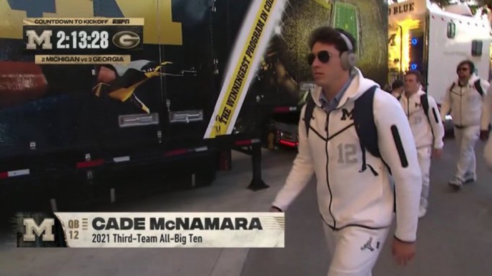TheJustTalkPod's tweet photo. Cade McNamara with the Jim Harbaugh sunglasses time to pound Michigan +7.5 @spreadoption_ https://t.co/mbJACGhHMU