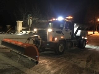 We will continue monitoring  the conditions tonight and have crews in at the early morning hours.  They will continue monitoring the street conditions and treat as needed. Please do not park cars on the road if possible and please give our crews room to work. Photo by Logan S.