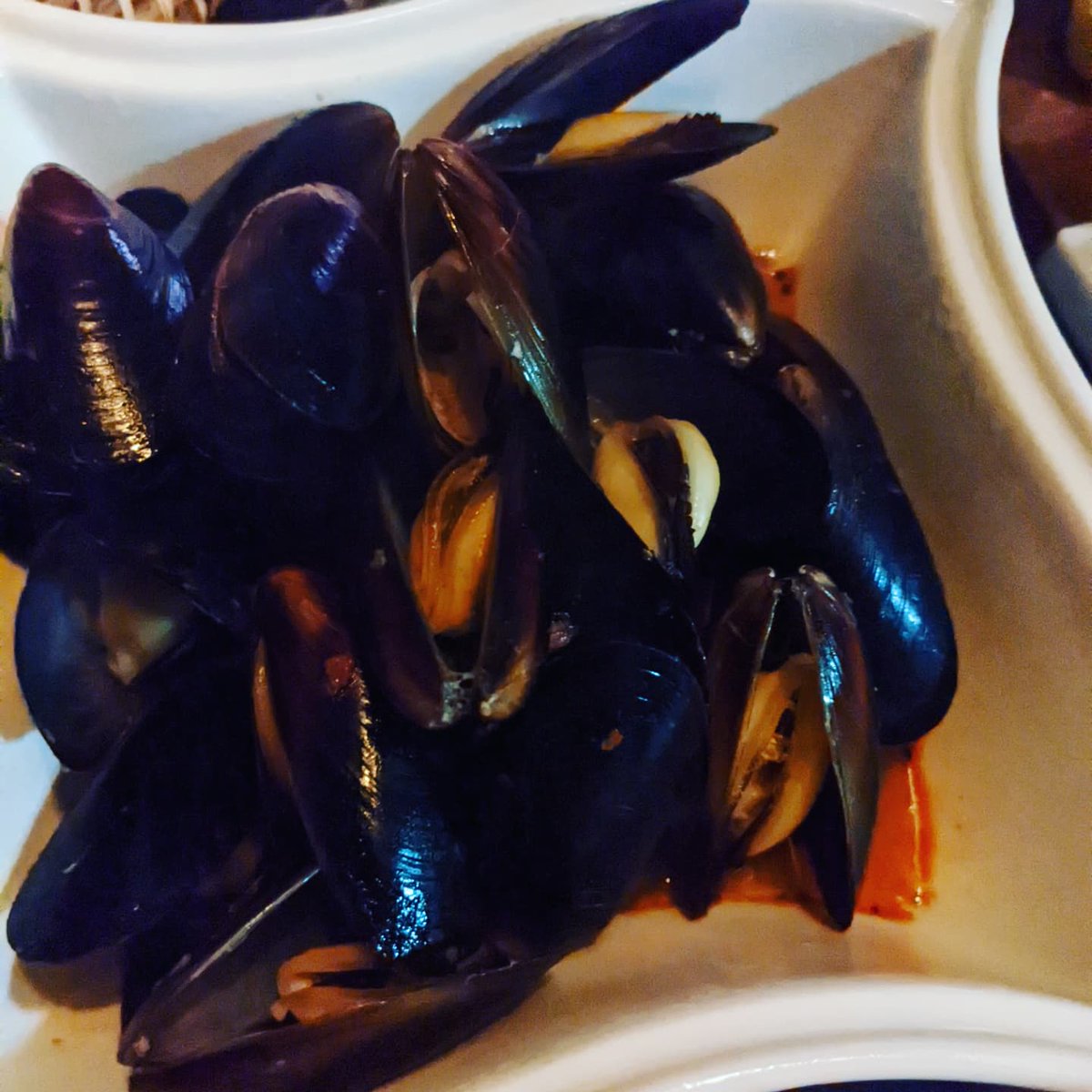 JPersinski's tweet photo. Cheers to 2022 and a last minute #isolation #NYEDinner thanks to #publix and #instacartdelivery ! Steamed mussels, & scallop and lobster mushroom ravioli. #monitorandadjust #teacherskills #momlife #cheerstothenewyear #nextchapter https://t.co/ahX1GGwbMF