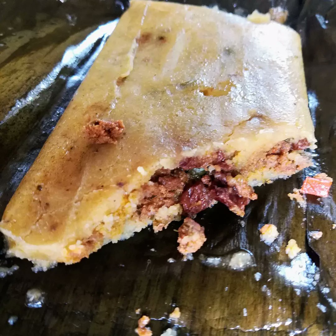 Trinifoodtour's tweet photo. Pastelle - a Trini 🇹🇹 Christmas food is made with cornmeal stuffed with minced meat, olives, capers, etc, wrapped in banana leaves, then boiled.

It's very similar to Venezuela's  #hallacas 🇻🇪 and Puerto Rico's #pastele 🇵🇷

Ever had any of these? https://t.co/ioXvxDFnBe