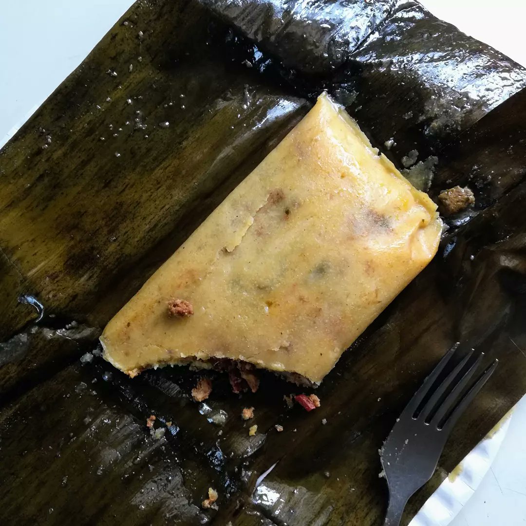 Trinifoodtour's tweet photo. Pastelle - a Trini 🇹🇹 Christmas food is made with cornmeal stuffed with minced meat, olives, capers, etc, wrapped in banana leaves, then boiled.

It's very similar to Venezuela's  #hallacas 🇻🇪 and Puerto Rico's #pastele 🇵🇷

Ever had any of these? https://t.co/ioXvxDFnBe