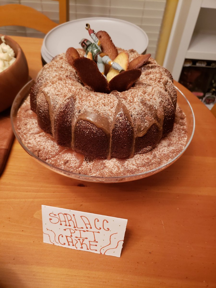 HK47nRevan's tweet photo. Went over to @TwinSunsAmanda and @_EricPfeifer 's house this evening to watch the premiere episode of #TheBookofBobaFett . Got to hang out with @Dan_Entertains and @_JessieSan too. The cake Amanda made was perfect for the occasion as it was out of this world! #StarWars https://t.co/bkA4Z6gsYD