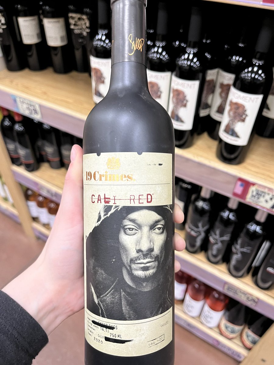 katie_walls05's tweet photo. I miss Harry styles.  Also look it’s snoop dog wine.  I want the bottle so bad😩 https://t.co/5F45Gu98mw