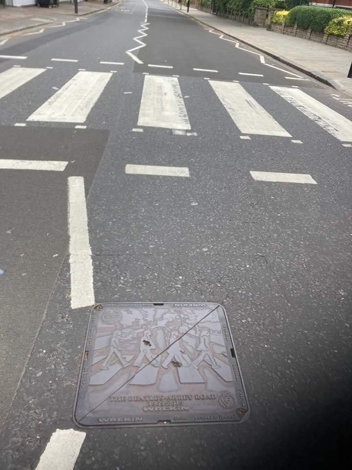 BeatlesBox's tweet image. The only acknowledgment of the importance of the Abbey Road crossing is on a manhole cover in the middle of the road!