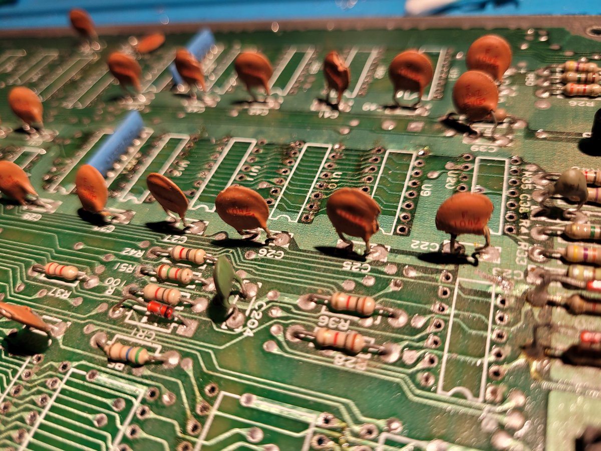 EE_Nick's tweet photo. Too bad I haven't got the starting picture of my latest project, but I can tell that this c64 board has been used for spareparts.
The circuits seems all good though,  but lots of parts are missing and a lot of ceramic disk caps have been broken. Here's what it looks right now... https://t.co/4UeuDKfOYO