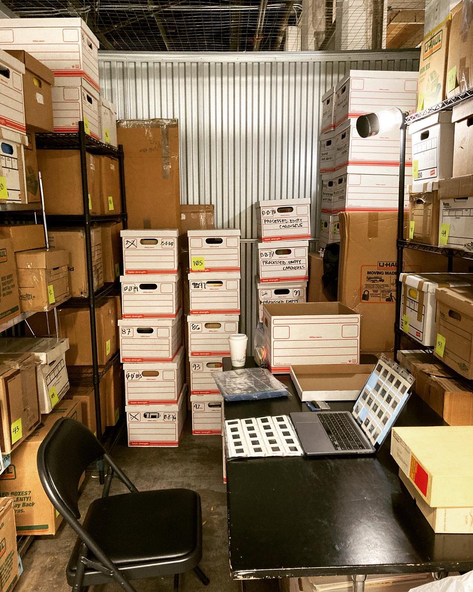 MSandArchives's tweet photo. Finally back in the space after two years of pandemic and it feels GOOD. First step: set up a work space for processing materials. 

Apologies to archivists everywhere for the ☕️ but it gets COLD in a Massachusetts storage space in the dead of winter! https://t.co/Rc5O1wB7iA