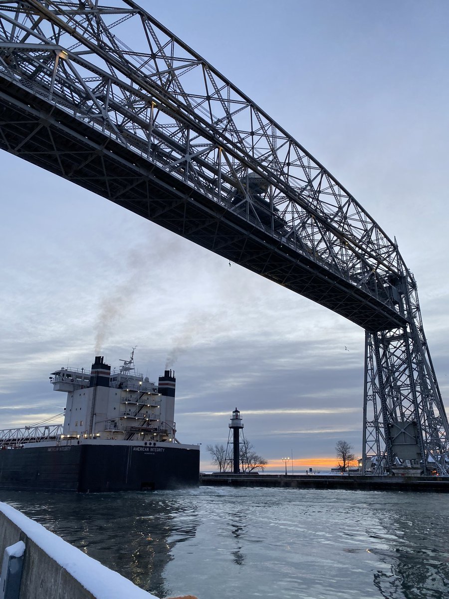 NicoledeB's tweet photo. Saw #americanintegrity #1000footer #greatlakesfreighter leaving the Twin Ports at sunrise. I imagine Iโll see her again on the Detroit River as she makes her way to her next load up #lakesuperior https://t.co/6W5bMqEz0v