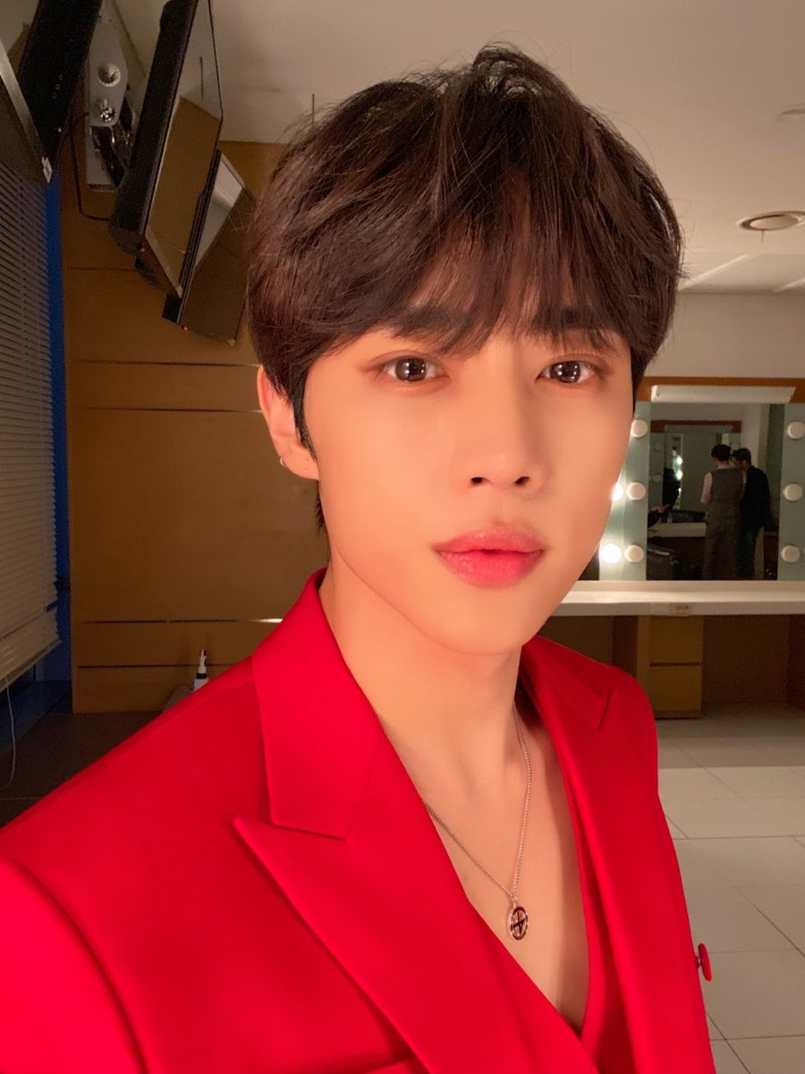 10ve0412's tweet photo. nothing can beat sunwoo in red suit https://t.co/LJPgxfkMtR