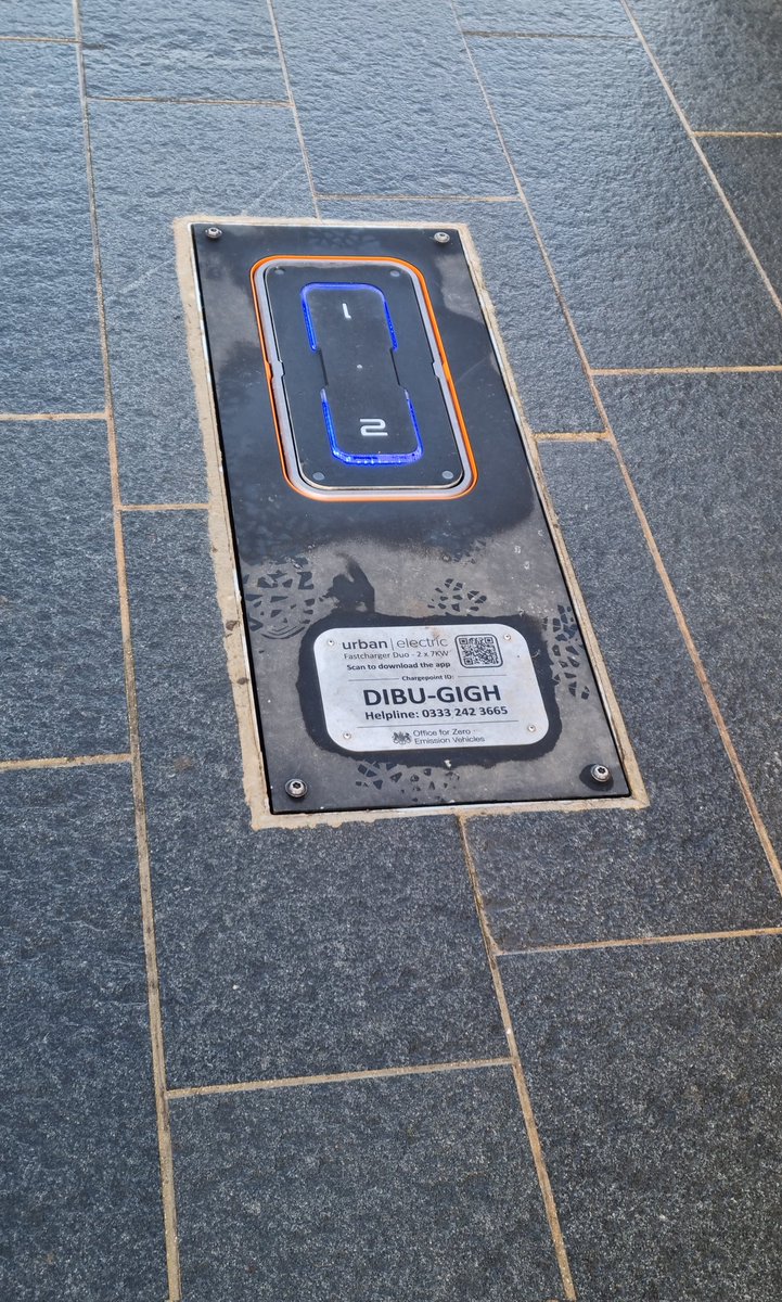 I'm that type of strange person that takes a minor detour to photograph a retractable electric car charging contraption in Dundee