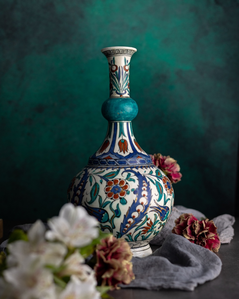 This vase, made by Edmé Samson et Cie in the late 19th century, was modeled after a 16th-century Turkish bottle vase. The vase is decorated with traditional Iznik floral motifs of tulips and carnations, which carried deep symbolism in Ottoman culture.⁠