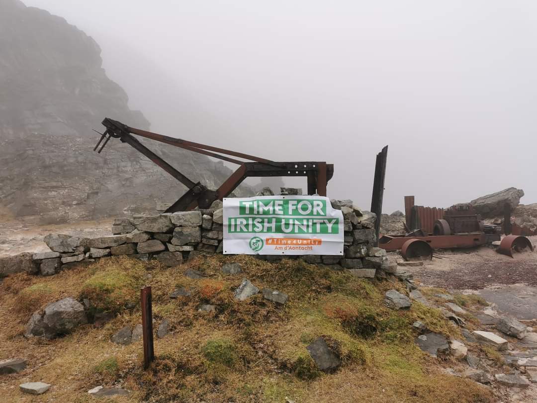 One man and his banner up on Muckish in Donegal #time4unity