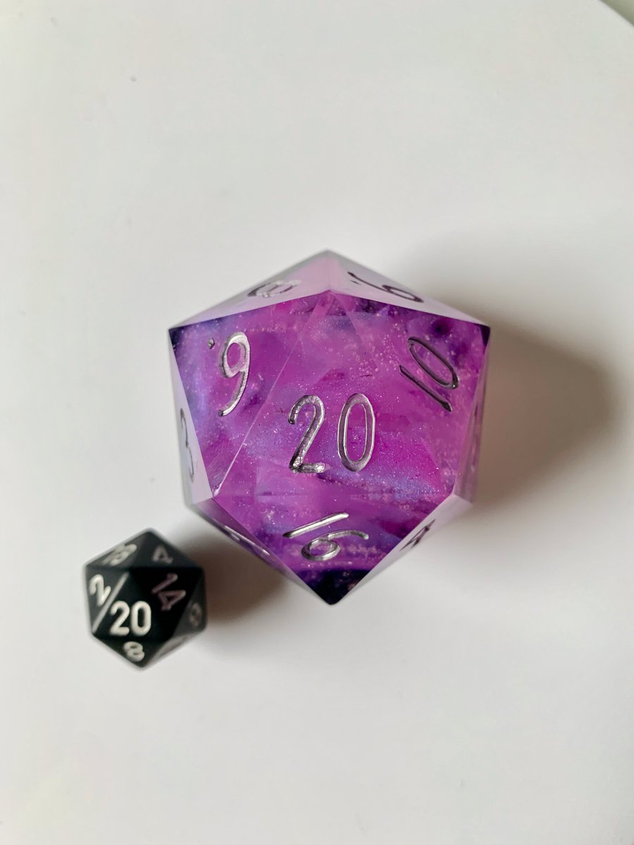 RpgrsD's tweet photo. I need to find this #dice a new home. This is a 50mm (~ 2in) d20. It is one-of-a-kind and could be yours! Shards of pink crystal shattered to release a dark essence #dnd #pathfinder #starfinder #TTRPGs #ttrpgfamily #dnd5e 

To enter the giveaway
❤️ Like &amp;
➡️ Follow &amp;
🔃 Retweet https://t.co/KfHyQLbGHm
