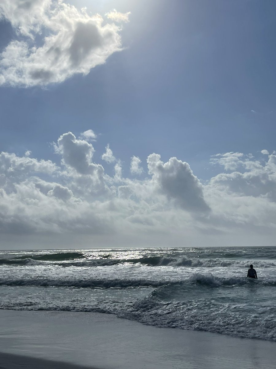 CorieHaynes's tweet photo. Sitting on the beach in a tank top and shorts, slathered in sunscreen, drinking a mimosa, on Dec 30, and thinking I should’ve put my swimsuit on. I’ve already been in once this morning… 🙌🏼 #beachinit #MiramarBeach https://t.co/KzdZkSaW87