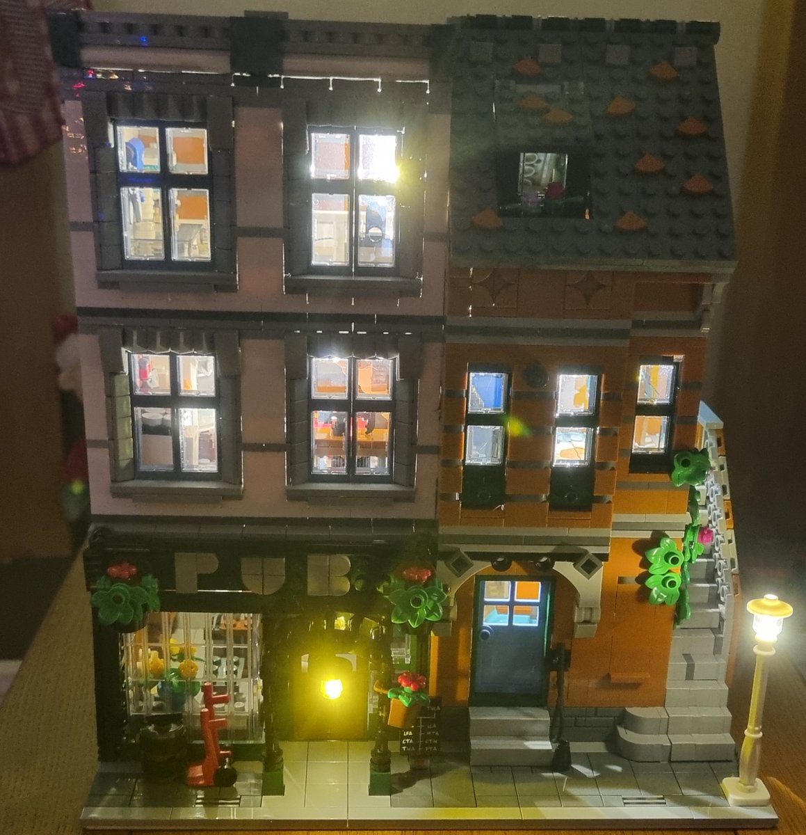 JustAPeeler's tweet photo. I love these lighting kits #Briksmax on my Lego Pub Modular @Rebrickable #rebrickable ... nearly ready for display, just need an @idisplayit kit. https://t.co/jyvRAAbP0P