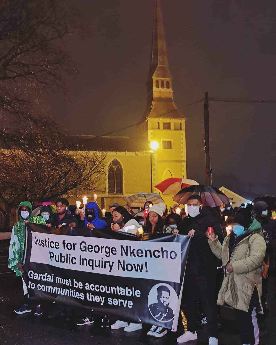 GeorgeNkencho's tweet photo. An emotional evening as family, friends and neighbours gathered in the rain to mark the anniversary of the killing of George Nkencho by armed Gardaí.

#JusticeforGeorgeNkencho https://t.co/QLxvDMBrDF