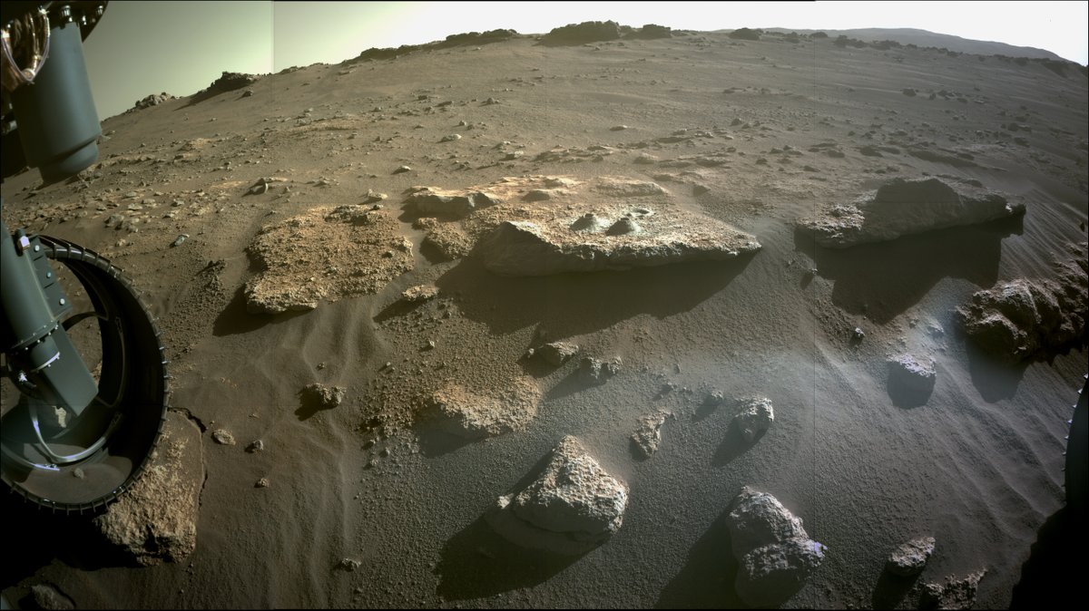 Front Hazcam image of the Robine rock with two dust cones. NASA/JPL-Caltech/martiandennis