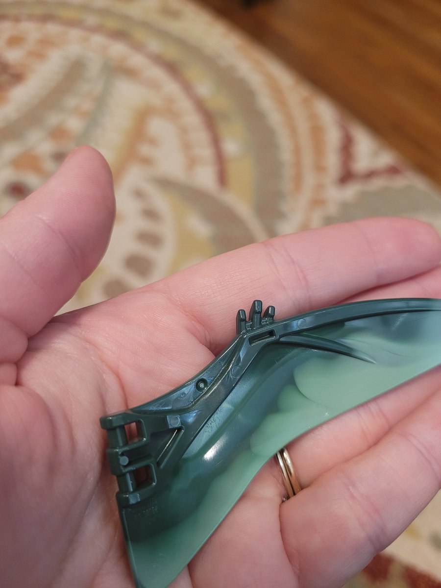 JenniferSwank's tweet photo. Building my 10280 Flower Bouquet I got for #Christmas. Settle a bet @LEGO_Group- Are these leaves actually pterodactyl wings you painted green? It would be really cool if they were. #LEGO https://t.co/GZwSQD7zze
