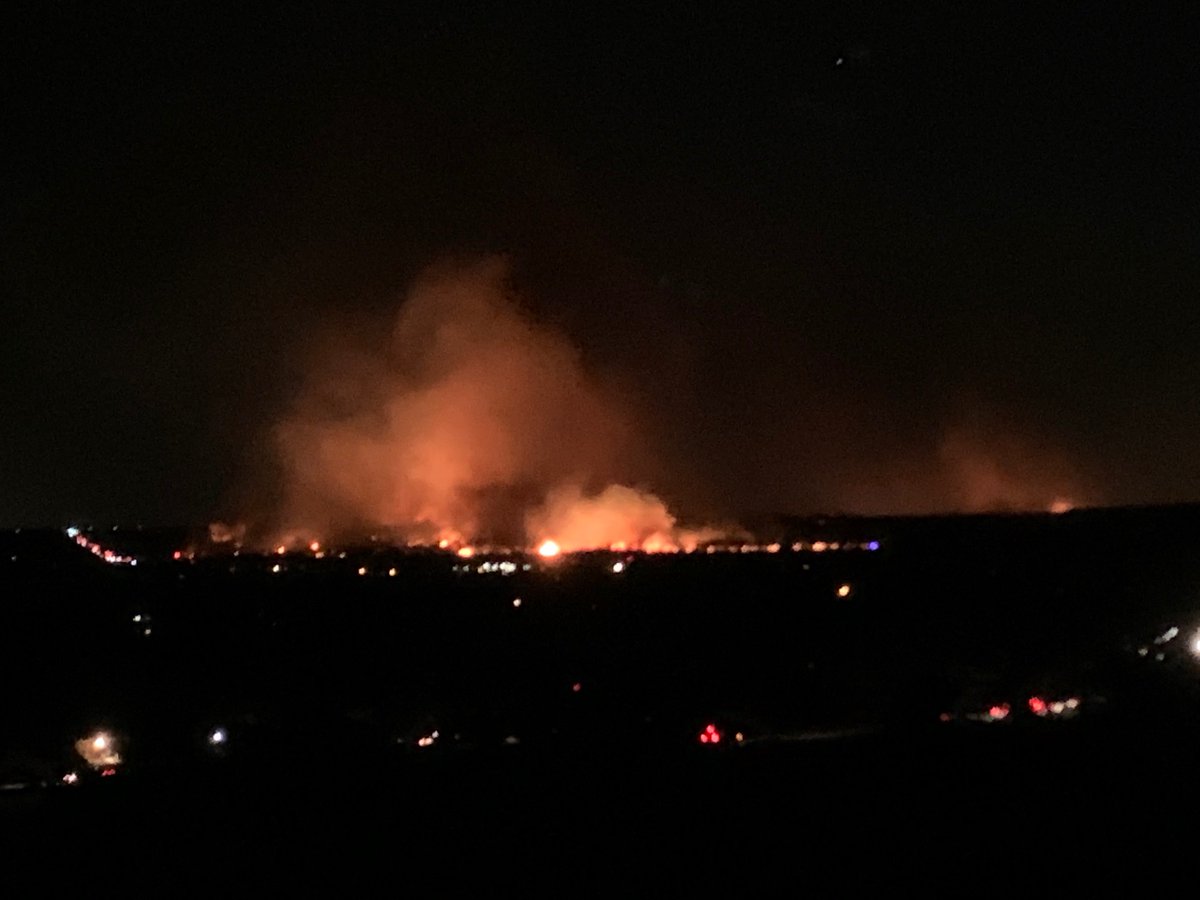 NWSBoulder's tweet photo. Our current view of the #MarshallFire from Boulder. We are deeply saddened for all who have lost today. #COwx https://t.co/Qq95K5yfEx